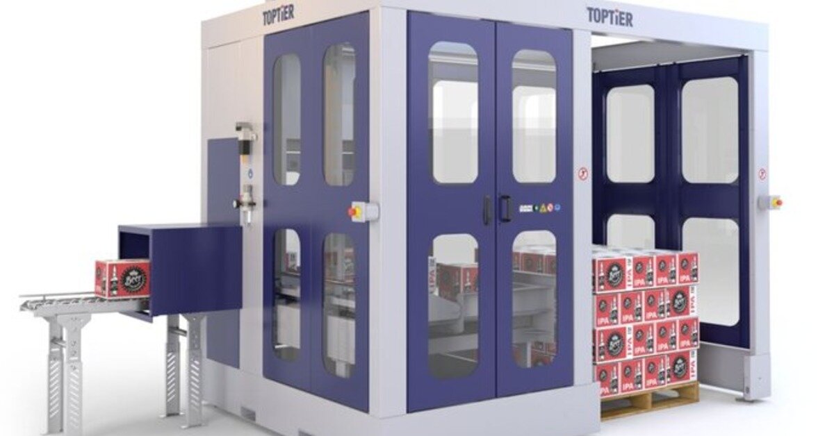 TopTier enclosed palletizer handling beverage cases on a conveyor beside a completed pallet of stacked cases.